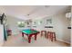 Inviting game room featuring a well-appointed billiards table and comfortable seating at 1426 S Pearl St, Denver, CO 80210