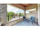 Relax on the cozy stone-covered patio with a seating area and enjoy the neighborhood views at 1426 S Pearl St, Denver, CO 80210