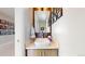 Stylish powder room featuring a vessel sink, custom mirror, and modern decor at 1426 S Pearl St, Denver, CO 80210