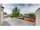 Enjoy panoramic views from this expansive rooftop patio featuring modern railings at 1426 S Pearl St, Denver, CO 80210