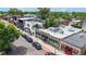 A street view showcasing a building with large windows and a vibrant commercial area at 1426 S Pearl St, Denver, CO 80210