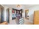 Spacious walk-in closet with custom shelving, center island, and ample storage space at 1426 S Pearl St, Denver, CO 80210