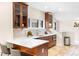 Bright kitchen with quartz countertops, a stylish backsplash, and stainless steel appliances at 1469 S Lincoln St, Denver, CO 80210