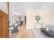 Bright living room with hardwood floors, open floor plan and modern decor at 1469 S Lincoln St, Denver, CO 80210