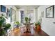 Bright dining area with glass-top table and modern chairs at 2 Adams St # 1010, Denver, CO 80206