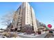 High-rise apartment building with landscaping and street view at 2 Adams St # 1010, Denver, CO 80206