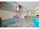 Relaxing hot tub area adjacent to the pool at 2 Adams St # 1010, Denver, CO 80206