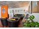 Living room with gray sofa and unique wall art at 2 Adams St # 1010, Denver, CO 80206