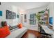 Home office with built-in shelving and comfortable workspace at 2 Adams St # 1010, Denver, CO 80206