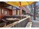 Outdoor patio seating area with table and chairs at 2 Adams St # 1010, Denver, CO 80206