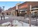 View of storefronts including Chipotle and other businesses at 2 Adams St # 1010, Denver, CO 80206