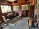Sun room features multiple windows and various furniture pieces, with natural light at 3036 W Clyde Pl, Denver, CO 80211
