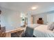 View of bedroom leading to an ensuite bathroom with walk in shower at 3752 S Helena Way, Aurora, CO 80013