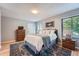 Bright bedroom with natural light, comfortable queen bed, and stylish décor at 3752 S Helena Way, Aurora, CO 80013