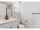 Contemporary bathroom features a stylish vanity with great natural lighting at 1784 Morgan Dr, Erie, CO 80516