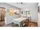 Cozy dining room area adjacent to kitchen, featuring a view into the kitchen at 1563 S Trenton Ct, Denver, CO 80231