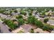 Aerial view of a home surrounded by trees, residential neighborhood, and a green backyard at 5167 Sable St, Denver, CO 80239