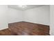 Bedroom with hardwood floors and a window at 5167 Sable St, Denver, CO 80239