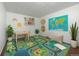 Bright playroom with colorful rug, artwork, and playful decor at 5167 Sable St, Denver, CO 80239