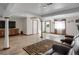 Finished basement offers natural light, stylish columns, modern flooring, and access to the backyard at 18553 County Road 5, Berthoud, CO 80513