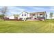 Charming two-story home features well-manicured lawn and beautiful brick accents, offering delightful curb appeal at 18553 County Road 5, Berthoud, CO 80513