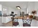 Kitchen with granite countertops, stainless steel appliances, and breakfast bar seating at 18553 County Road 5, Berthoud, CO 80513