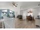 Open-concept home with vaulted ceilings, fireplace, and views of the living and dining spaces at 18553 County Road 5, Berthoud, CO 80513
