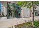 Modern building entrance featuring a large glass facade and decorative design elements, creating a welcoming ambiance at 155 Steele St # 418, Denver, CO 80206