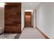 Elegant hallway with wooden accents leading to unit 418, showcasing refined design at 155 Steele St # 418, Denver, CO 80206