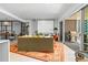 Sunlit living area featuring modern design elements and smooth access to outdoor balcony with grill at 155 Steele St # 418, Denver, CO 80206