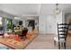 Airy open-concept layout living area extending into kitchen, promoting social gatherings at 155 Steele St # 418, Denver, CO 80206