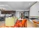 Contemporary living area with an open layout, flowing into the kitchen and dining spaces at 155 Steele St # 418, Denver, CO 80206