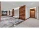 Luxurious lobby with decorative wood panels, leading to residences at 155 Steele St # 418, Denver, CO 80206