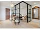 Modern office space with hardwood floors and a chandelier at 155 Steele St # 418, Denver, CO 80206