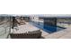 Stunning rooftop pool with lounge chairs, offering a luxurious and relaxing experience at 155 Steele St # 418, Denver, CO 80206
