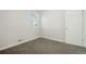 Neutral bedroom with gray carpet and a large window at 5455 Dudley Ct, Arvada, CO 80002