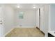 Multipurpose room with wood-look flooring, natural light, and closet space at 5455 Dudley Ct, Arvada, CO 80002