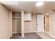 Basement closet is between the bedroom and the tiled room with bright lighting at 8540 Corona St, Denver, CO 80229