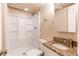 Bathroom featuring white shower, granite vanity, and toilet at 8540 Corona St, Denver, CO 80229