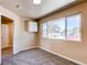 Cozy bedroom featuring neutral paint, plush carpeting, and natural light, offering a calming retreat at 8540 Corona St, Denver, CO 80229