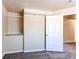 Bedroom closet with custom shelving and neutral tones, maximizes storage and organization at 8540 Corona St, Denver, CO 80229