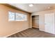 Comfortable bedroom with a closet and a bright window showing neighborhood views at 8540 Corona St, Denver, CO 80229
