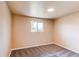 Neutral bedroom featuring plush carpet and a bright window with natural light at 8540 Corona St, Denver, CO 80229
