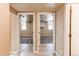 Hallway featuring entrances to two basement rooms at 8540 Corona St, Denver, CO 80229