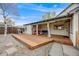 Outdoor deck area with furniture, grill, and serene backyard views at 1055 Quartz St, Golden, CO 80401