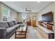 Bright living room with modern furniture, hardwood floors, and large windows at 1055 Quartz St, Golden, CO 80401
