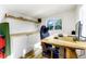 Bright office space features built-in shelves, natural light, and desk, providing a comfortable work environment at 1055 Quartz St, Golden, CO 80401
