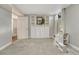 Finished basement with carpet, built in shelves, and playroom area at 4539 E Caley Pl, Centennial, CO 80121