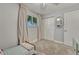 Bright bedroom with neutral walls, plush carpeting, and a closet at 4539 E Caley Pl, Centennial, CO 80121
