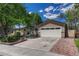 Beautifully maintained one-story home with two-car garage and well-kept front yard landscaping at 4539 E Caley Pl, Centennial, CO 80121